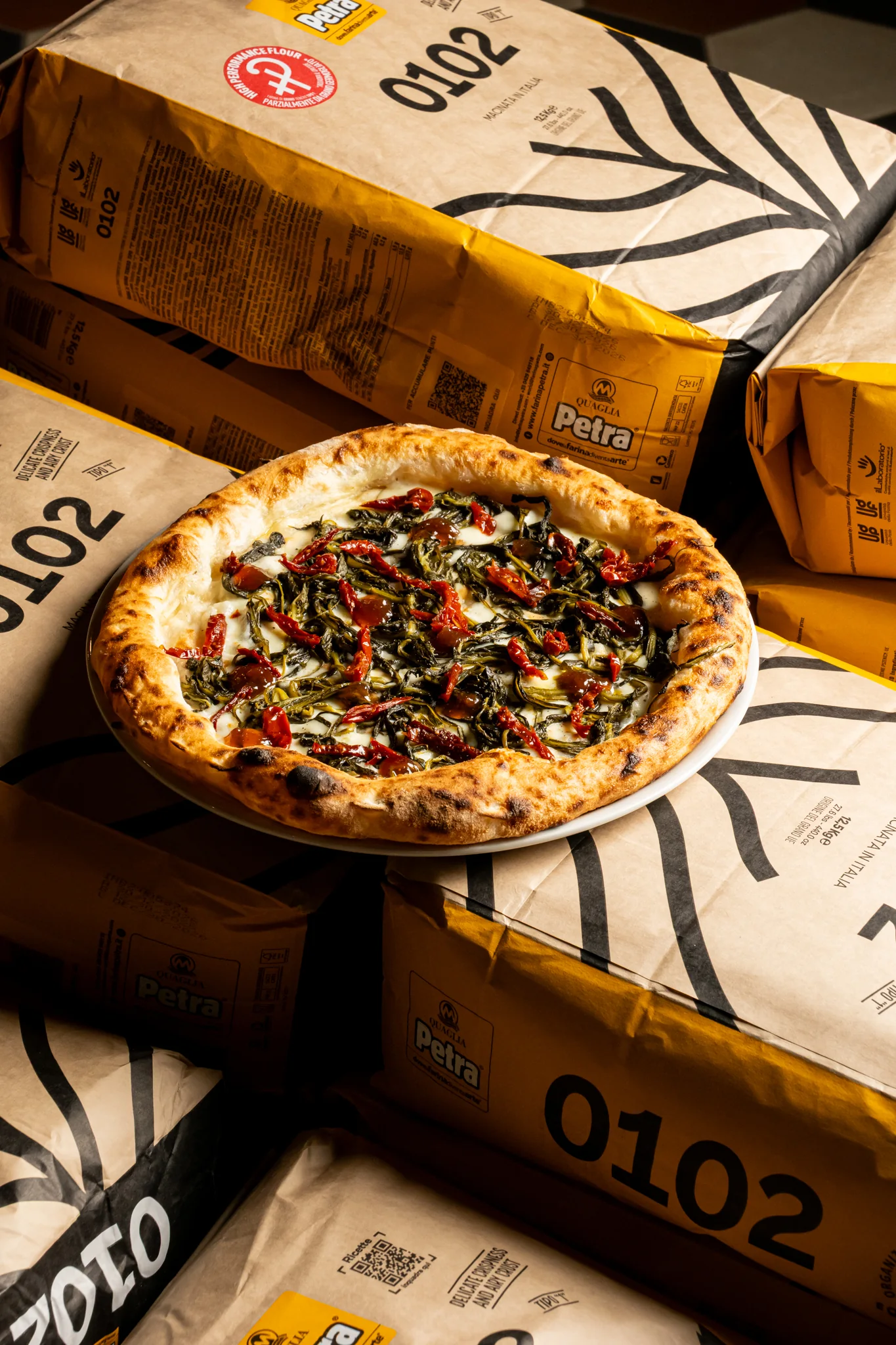 Pizza FERMENTO servita al tavolo